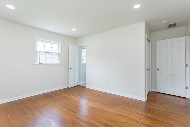 1002 Coalter St, Staunton, VA 24401 - unfurnished room with wood finished floors, baseboards, and recessed lighting