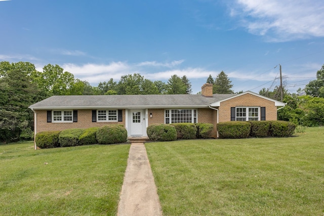 1002 Coalter St, Staunton, VA 24401 - single story home with brick siding, a front yard, and a chimney