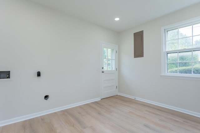 1002 Coalter St, Staunton, VA 24401 - washroom with healthy amount of natural light, light wood-style floors, washer hookup, electric panel, and recessed lighting