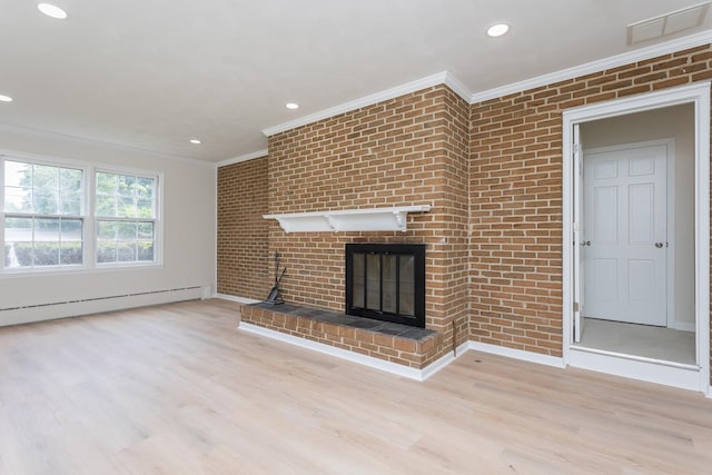1002 Coalter St, Staunton, VA 24401 - unfurnished living room with ornamental molding, a baseboard heating unit, light wood-style flooring, baseboards, and recessed lighting