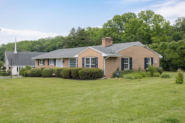 1002 Coalter St, Staunton, VA 24401 - ranch-style home with brick siding, a chimney, and a front yard