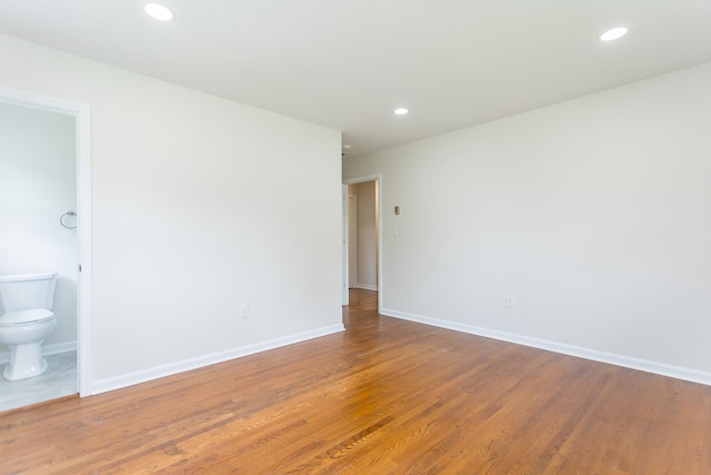 1002 Coalter St, Staunton, VA 24401 - empty room with wood finished floors, baseboards, and recessed lighting