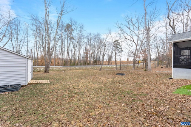 view of yard with a sunroom