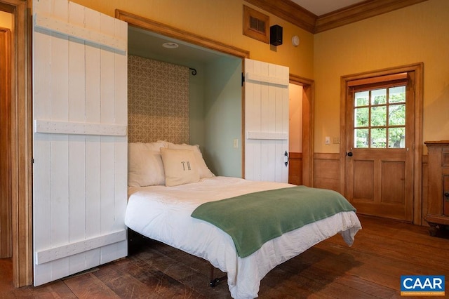 240 Broad Axe Rd, Charlottesville, VA 22903 - bedroom with wood-type flooring, wooden walls, wainscoting, and ornamental molding