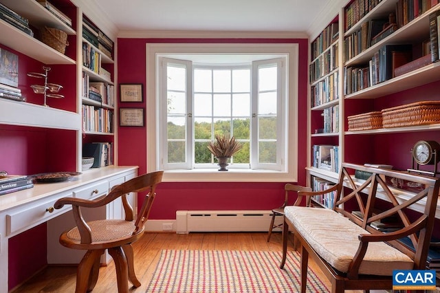 240 Broad Axe Rd, Charlottesville, VA 22903 - living area featuring built in desk, ornamental molding, a wealth of natural light, and a baseboard heating unit