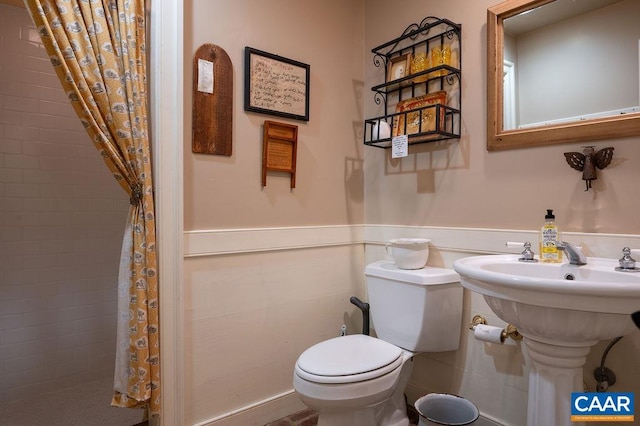 240 Broad Axe Rd, Charlottesville, VA 22903 - full bathroom with toilet, wainscoting, and tiled shower