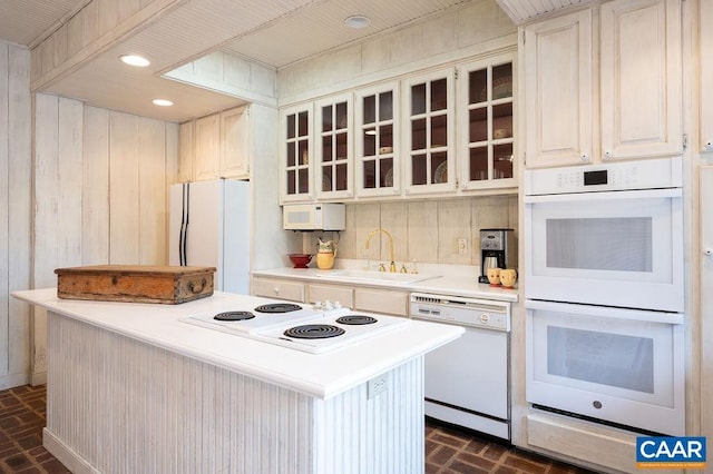 240 Broad Axe Rd, Charlottesville, VA 22903 - kitchen featuring light countertops, brick patterned floor, a sink, and white appliances