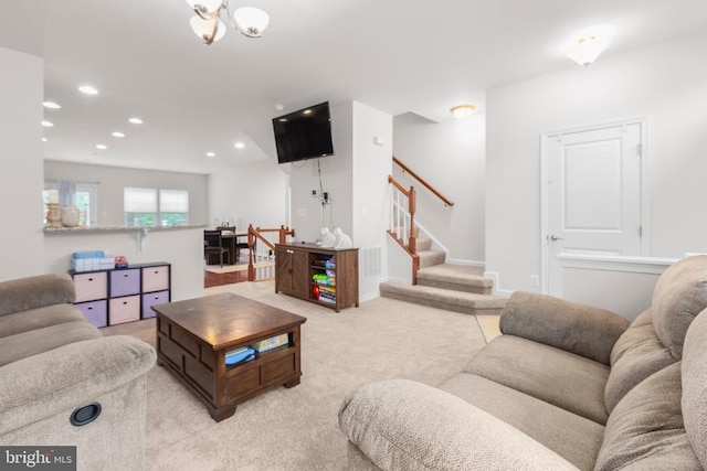 4556 Alliance Way, Fredericksburg, VA 22408 - living room with light carpet, stairs, recessed lighting, and a chandelier