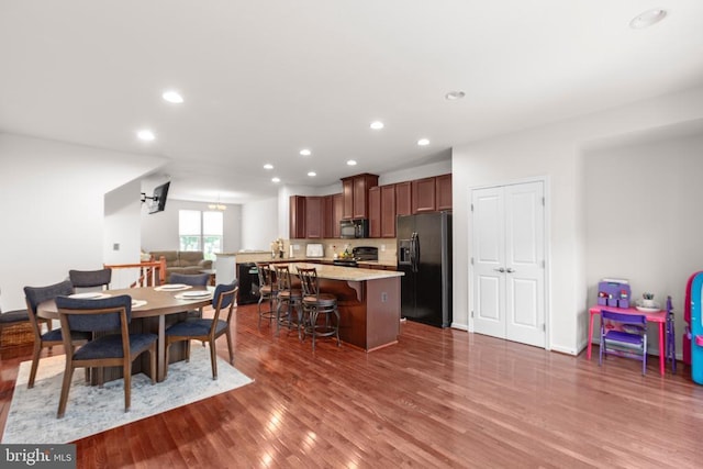 4556 Alliance Way, Fredericksburg, VA 22408 - dining area with dark wood-style floors and recessed lighting