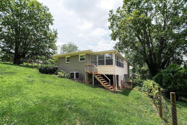 916 Selma Blvd, Staunton, VA 24401 - rear view of house with stairs, a yard, and a sunroom