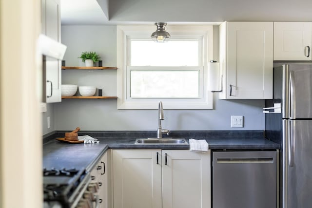 916 Selma Blvd, Staunton, VA 24401 - kitchen with stainless steel appliances, dark countertops, white cabinets, and open shelves