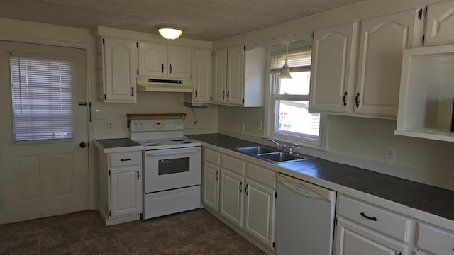 kitchen featuring a sink, tile counters, white cabinets, white appliances, and under cabinet range hood