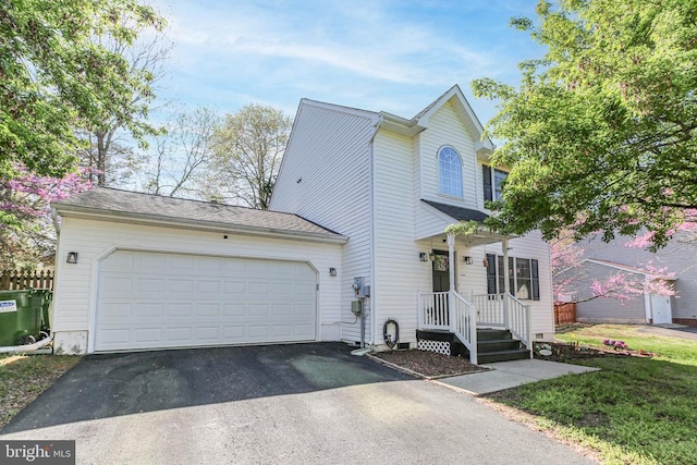 view of front facade featuring an attached garage and driveway