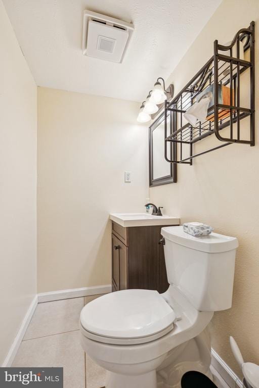 10603 Bluebird Ln, Spotsylvania, VA 22553 - half bath featuring vanity and tile patterned floors