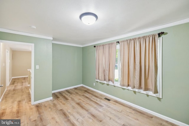 10603 Bluebird Ln, Spotsylvania, VA 22553 - empty room featuring crown molding, wood finished floors, and a smoke detector