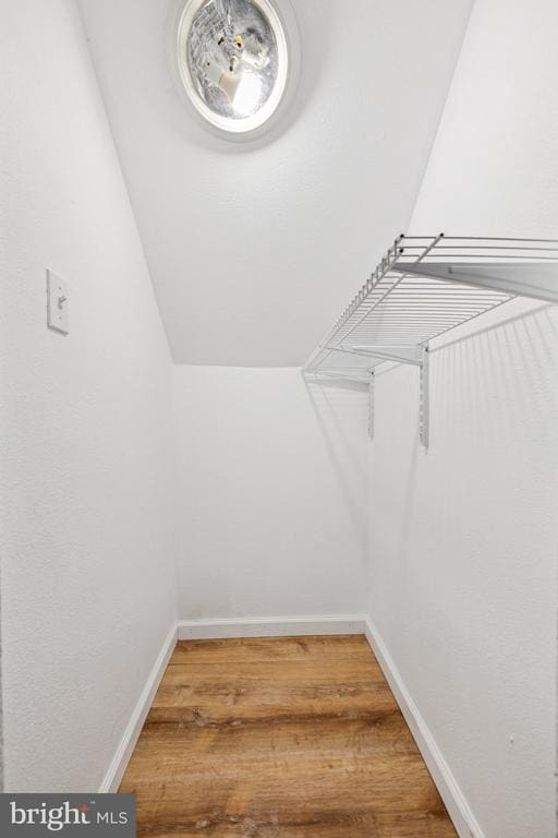 10603 Bluebird Ln, Spotsylvania, VA 22553 - walk in closet featuring wood finished floors