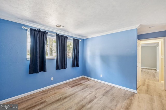 10603 Bluebird Ln, Spotsylvania, VA 22553 - empty room with wood finished floors, crown molding, and a smoke detector