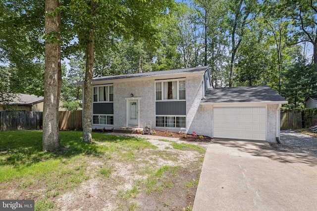 10603 Bluebird Ln, Spotsylvania, VA 22553 - split foyer home featuring an attached garage and driveway