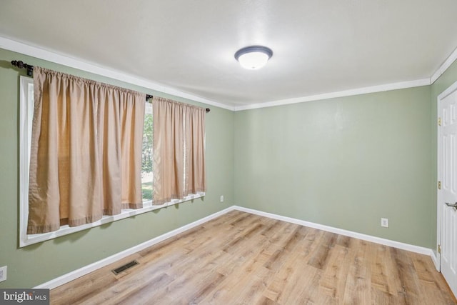 10603 Bluebird Ln, Spotsylvania, VA 22553 - unfurnished room with wood finished floors and crown molding