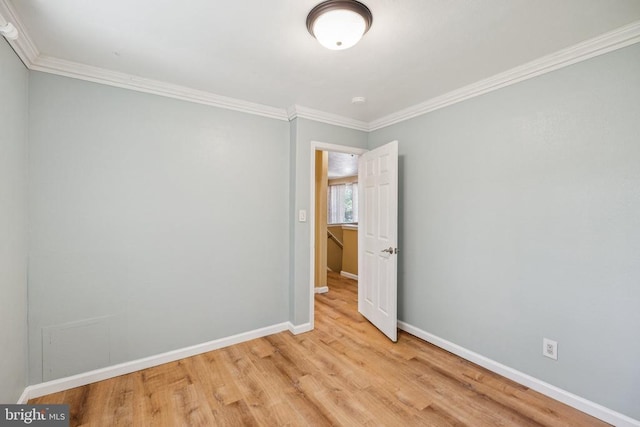 10603 Bluebird Ln, Spotsylvania, VA 22553 - empty room featuring crown molding and light wood-type flooring