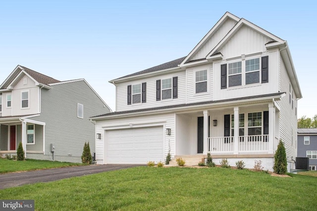 35663 Aspen Way, Locust Grove, VA 22508 - view of front of property featuring a porch, driveway, a garage, a front yard, and board and batten siding