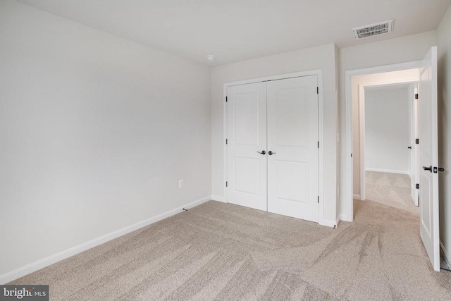 35663 Aspen Way, Locust Grove, VA 22508 - unfurnished bedroom with carpet, baseboards, and a closet