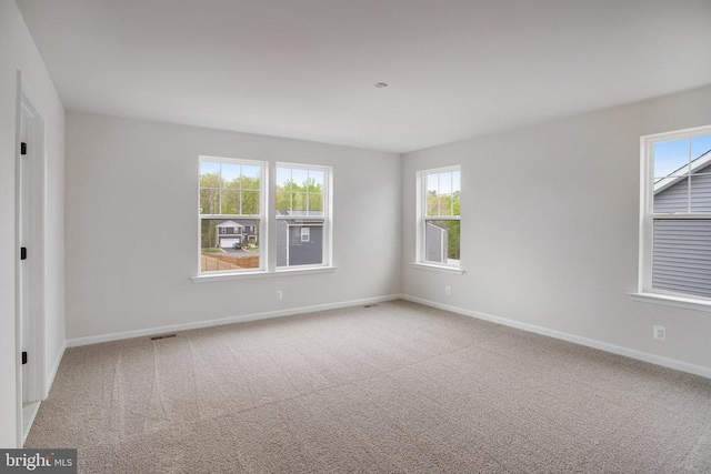35663 Aspen Way, Locust Grove, VA 22508 - unfurnished room featuring healthy amount of natural light, carpet, and baseboards