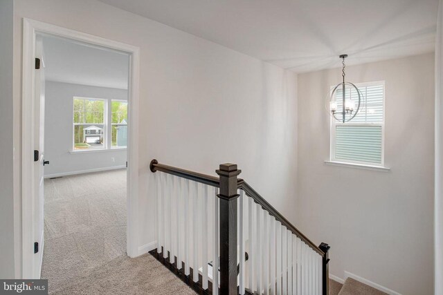 35663 Aspen Way, Locust Grove, VA 22508 - staircase featuring carpet floors, a chandelier, and baseboards
