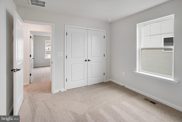 35663 Aspen Way, Locust Grove, VA 22508 - unfurnished bedroom with carpet floors, a closet, and baseboards