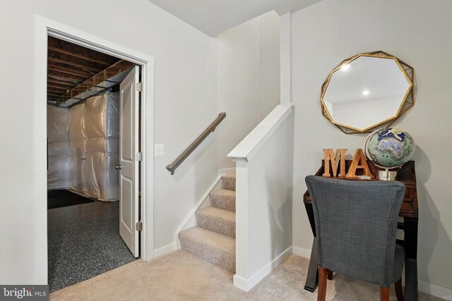 stairs with carpet flooring and baseboards