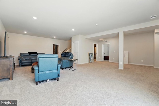 living area with light colored carpet, stairway, baseboards, and recessed lighting
