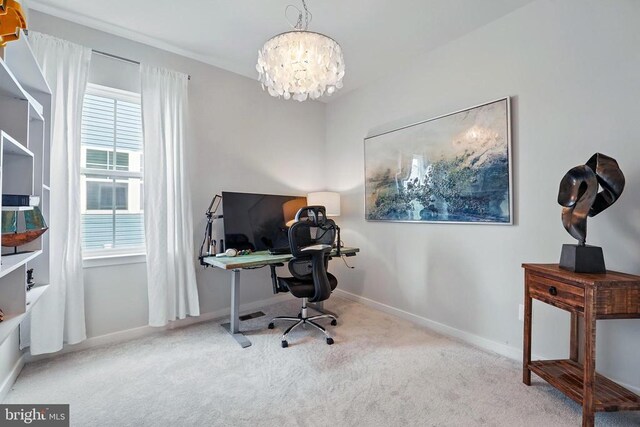 carpeted office featuring a chandelier and baseboards