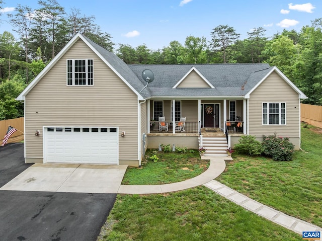 8289 Three Notch Rd, Louisa, VA 23093 - view of front of house with a porch, driveway, an attached garage, and roof with shingles