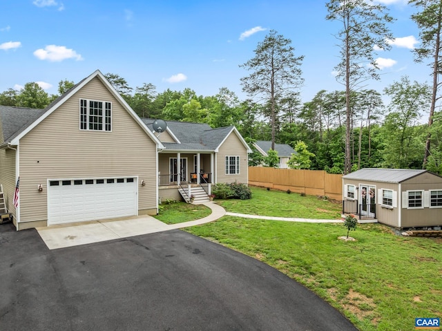 8289 Three Notch Rd, Louisa, VA 23093 - view of front of home with driveway, an attached garage, roof with shingles, and a porch