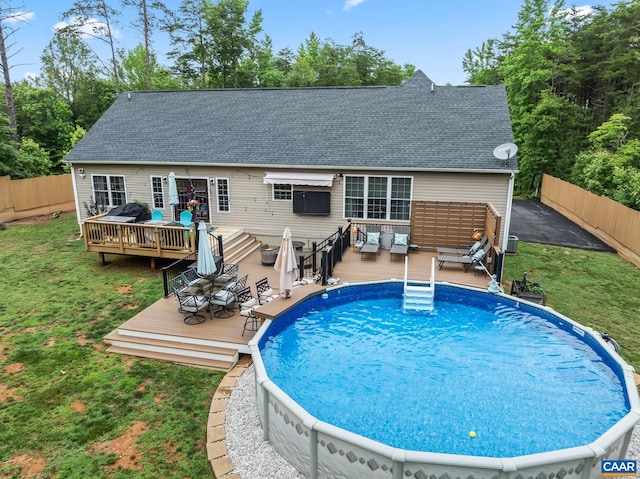 8289 Three Notch Rd, Louisa, VA 23093 - rear view of property featuring an outdoor living space, a wooden deck, a fenced backyard, and roof with shingles