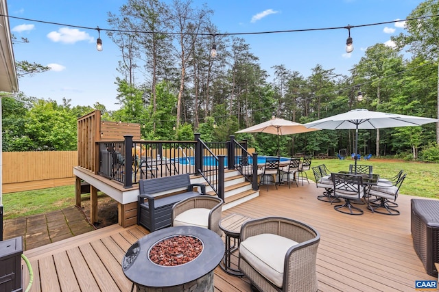 8289 Three Notch Rd, Louisa, VA 23093 - wooden terrace with outdoor dining space and view of scattered trees