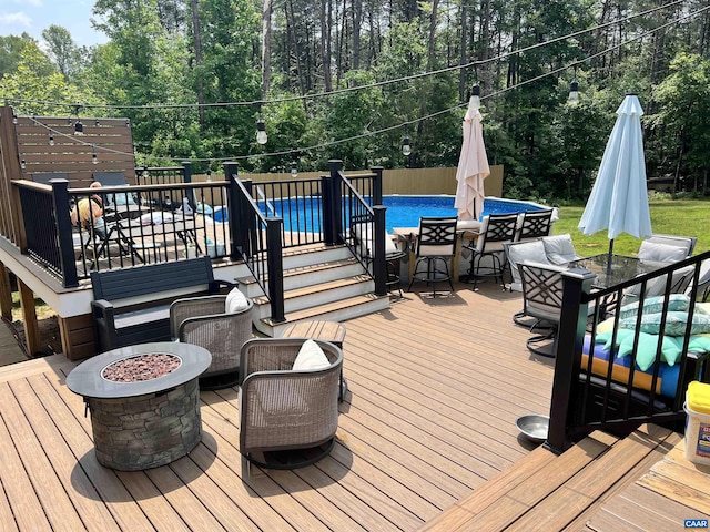 8289 Three Notch Rd, Louisa, VA 23093 - deck with a fire pit and outdoor dining area