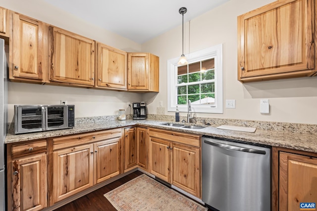 8289 Three Notch Rd, Louisa, VA 23093 - kitchen featuring stainless steel dishwasher, dark wood-style floors, light stone countertops, decorative light fixtures, and light brown cabinetry
