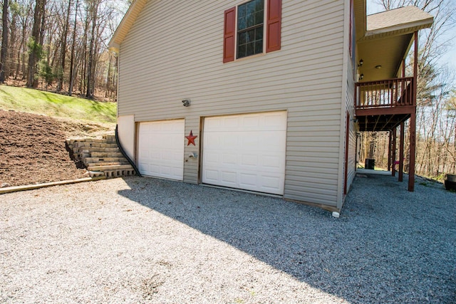 9839 Brunk Spring Ln, Broadway, VA 22815 - view of property exterior featuring a garage and gravel driveway