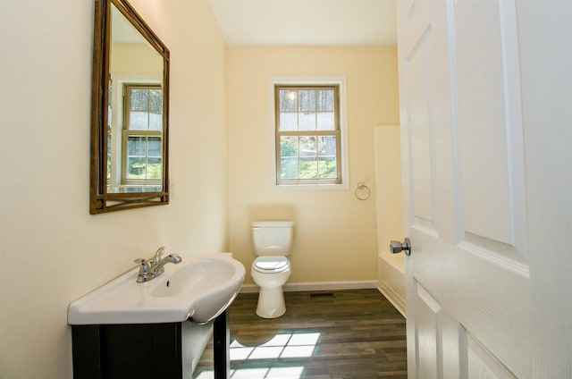 9839 Brunk Spring Ln, Broadway, VA 22815 - bathroom featuring healthy amount of natural light, vanity, and wood finished floors