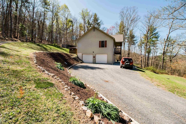 9839 Brunk Spring Ln, Broadway, VA 22815 - view of home's exterior featuring gravel driveway, an attached garage, and a yard