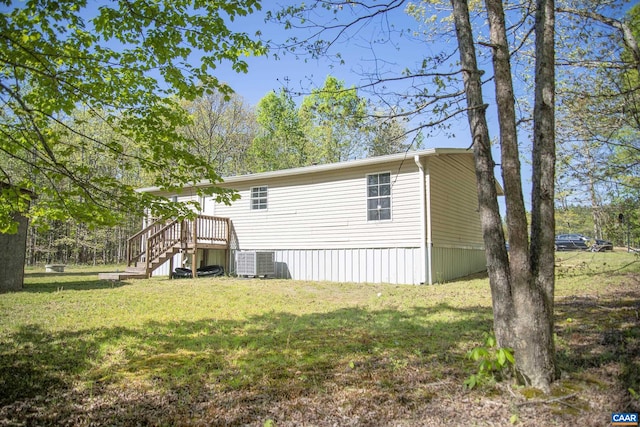 289 Mountain Laurel Rd, Palmyra, VA 22963 - back of house with central AC unit, a yard, and stairs