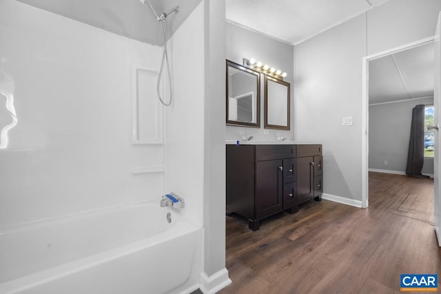 289 Mountain Laurel Rd, Palmyra, VA 22963 - bathroom with wood finished floors, tub / shower combination, vanity, and baseboards