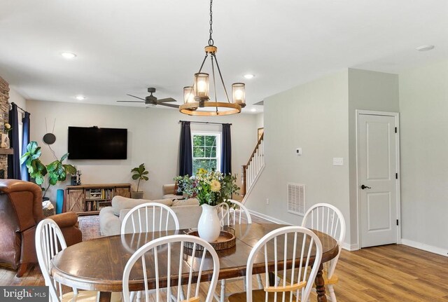 275 Freestyle Ln, Mineral, VA 23117 - dining space featuring a ceiling fan, light wood-type flooring, stairs, and recessed lighting
