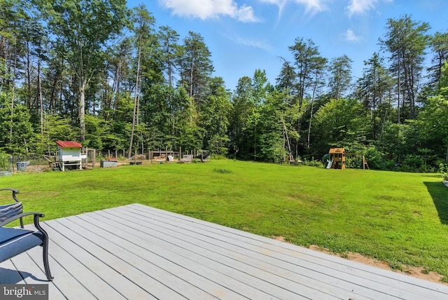 275 Freestyle Ln, Mineral, VA 23117 - deck featuring a playground and a lawn
