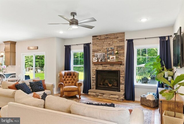 275 Freestyle Ln, Mineral, VA 23117 - living room with wood finished floors, healthy amount of natural light, ceiling fan, a fireplace, and recessed lighting