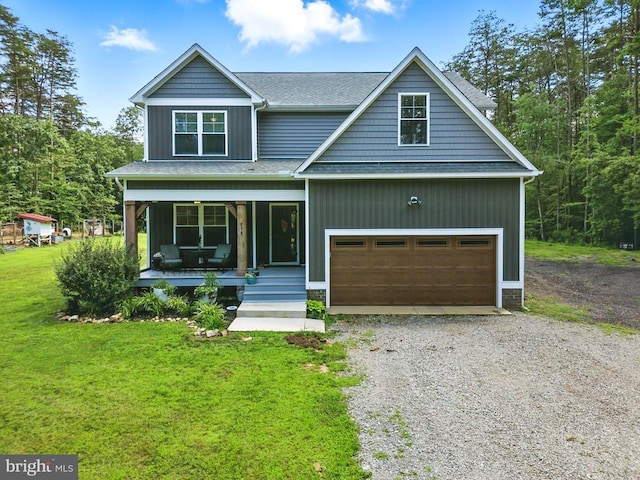 275 Freestyle Ln, Mineral, VA 23117 - view of front of property featuring covered porch, driveway, a front lawn, a garage, and roof with shingles