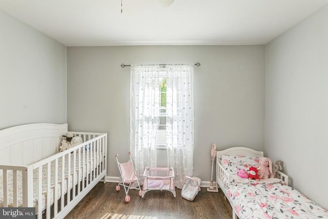 bedroom featuring wood finished floors