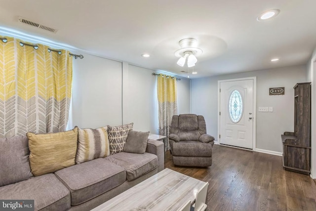 living area with recessed lighting, baseboards, ceiling fan, visible vents, and wood finished floors