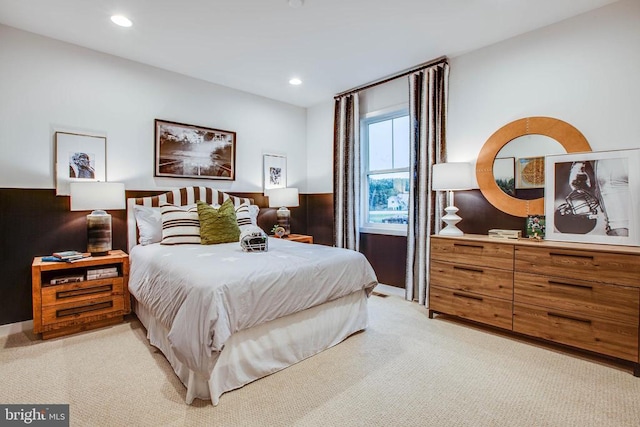 bedroom featuring light colored carpet and recessed lighting